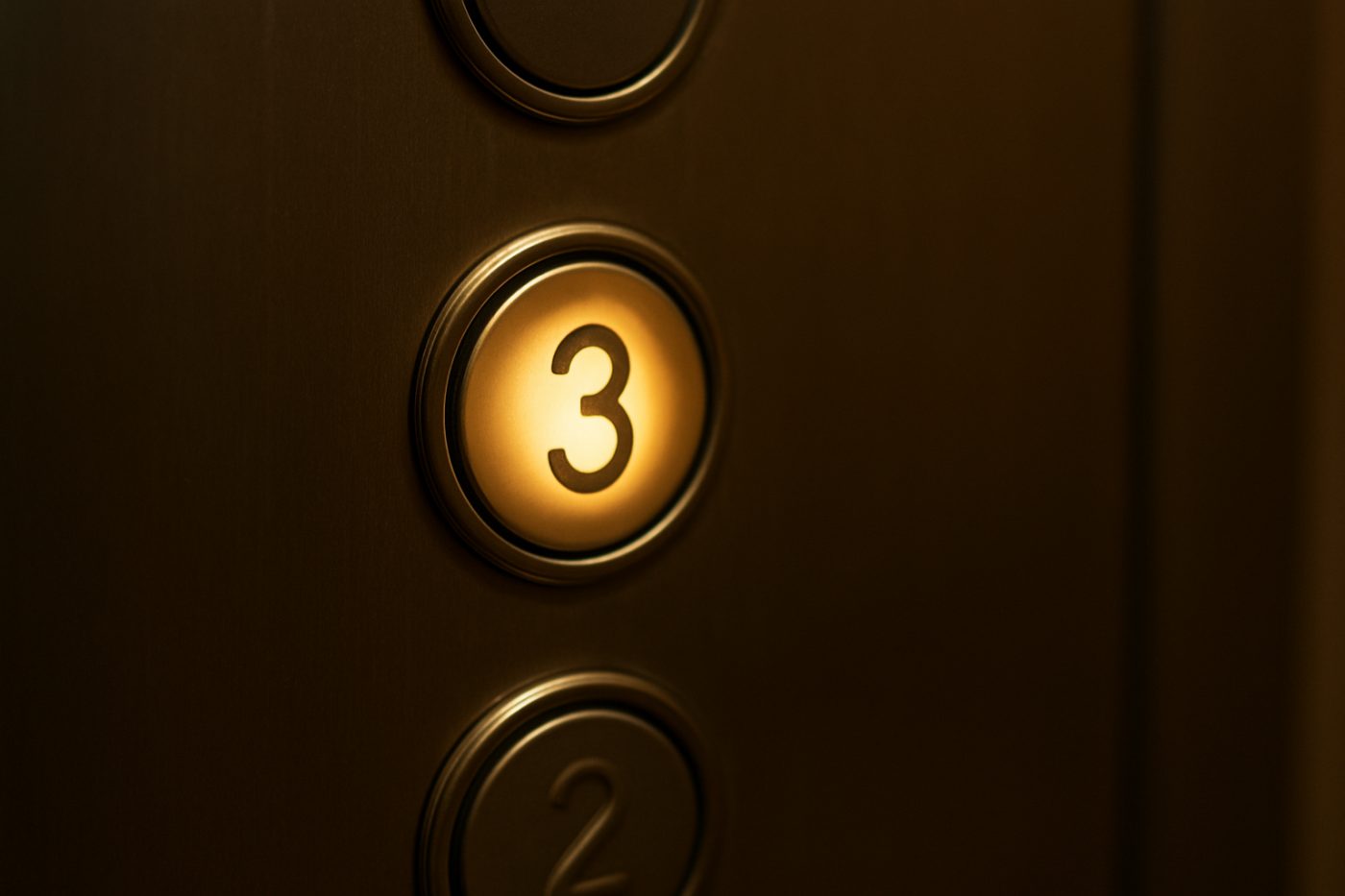 Illuminated third-floor lift button