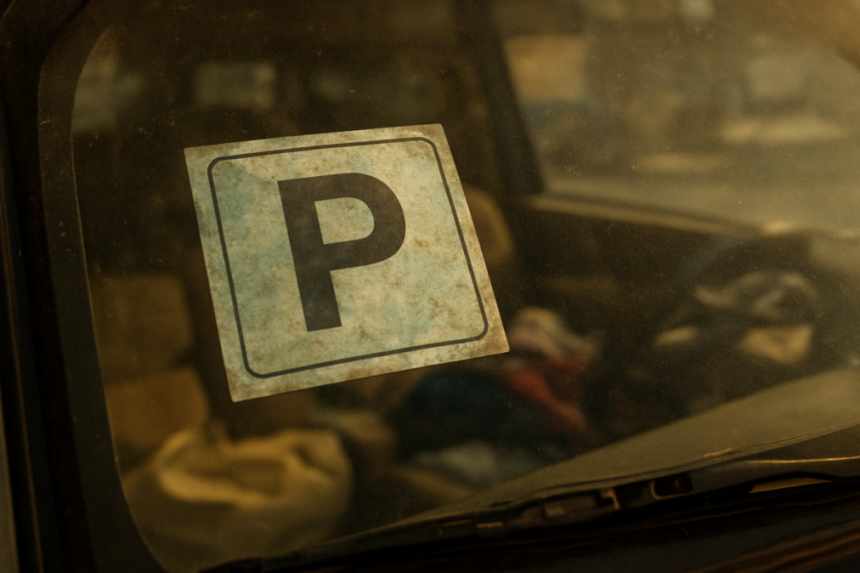 Faded parking permit close-up